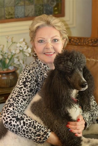 A Better Answer President and CEO Dee with her poodle Star